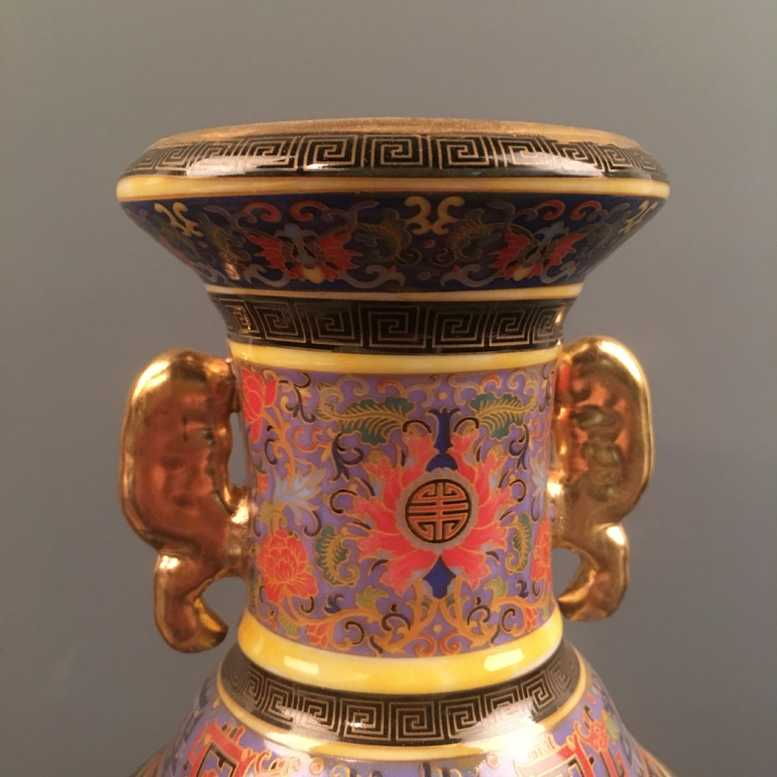 Pair of Chinese Famille Rose Porcelain Vase: Pair of Chinese Famille Rose Porcelain Vase 9-3/4'' H, 4-1/2'' W; 5 lb Shipping: We are able to pack and ship this item to an address in the United States for $60.00 via UPS Ground or USPS Priority Ma