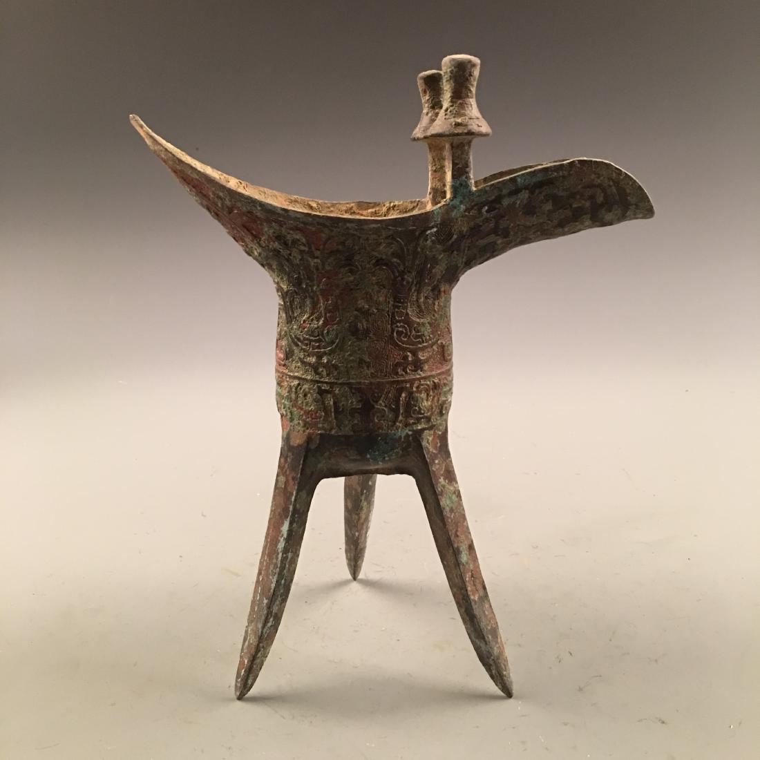 Chinese Bronze Tripod Wine Vessel: Chinese Bronze Tripod Wine Vessel 9'' H, 7-1/2'' W; 1.6 lb Shipping: We are able to pack and ship this item to an address in the United States for $30.00 via UPS Ground or USPS Priority Mail. Tracking