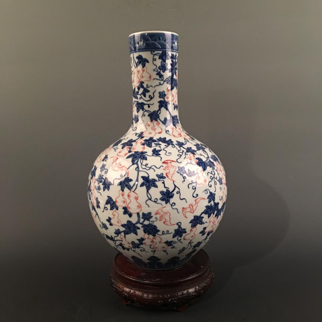 Chinese Blue-White Red Glazed 'Double-Goured' Vase,: Chinese Blue-White Red Glazed 'Double-Goured' Vase, Qianlong Mark 14-1/2'' H, 8'' W; 6.8 lb Shipping: We are able to pack and ship this item to an address in the United States for $40.00 via UPS Groun