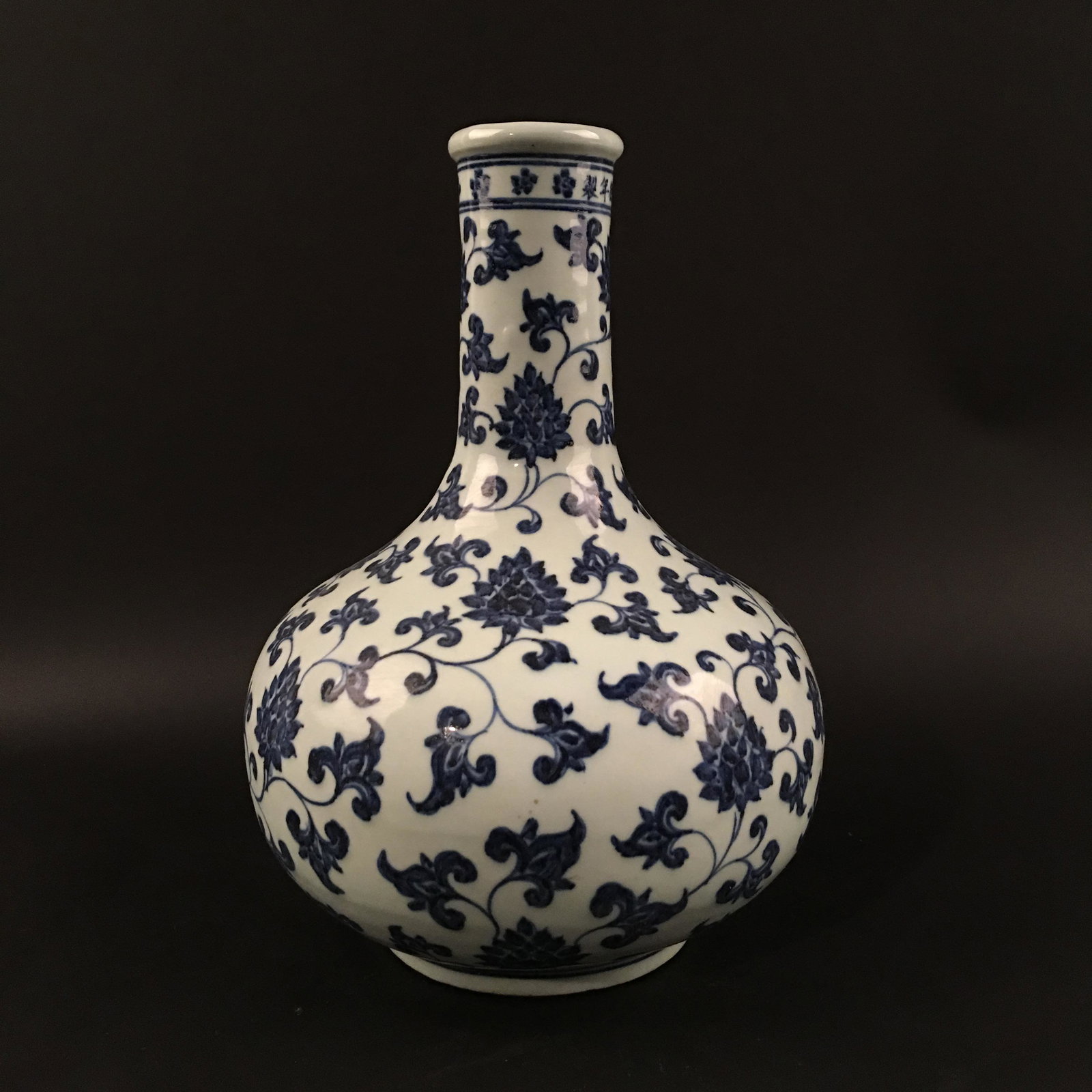 Chinese Blue-White 'Floral' Gobular Vase: Chinese Blue-White 'Floral' Gobular Vase 12-1/2'' H, 8'' W; 5.2 lb Shipping: We are able to pack and ship this item to an address in the United States for $30.00 via UPS Ground or USPS Priority Mail. 