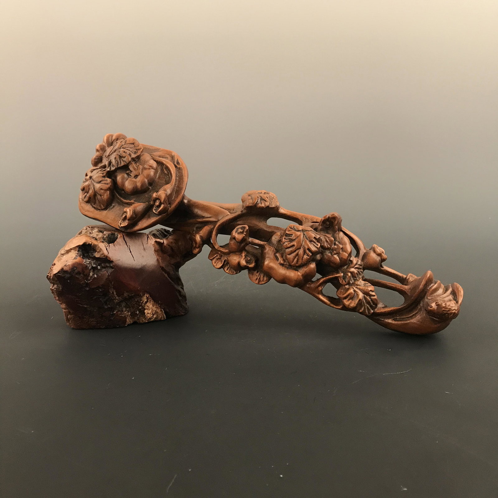 Chinese Boxwood Carved Ruyi: Chinese Boxwood Carved Ruyi 10-3/4'' H, 2-3/8'' W; 188 g Shipping: We are able to pack and ship this item to an address in the United States for $30.00 via UPS Ground or USPS Priority Mail. Tracking i