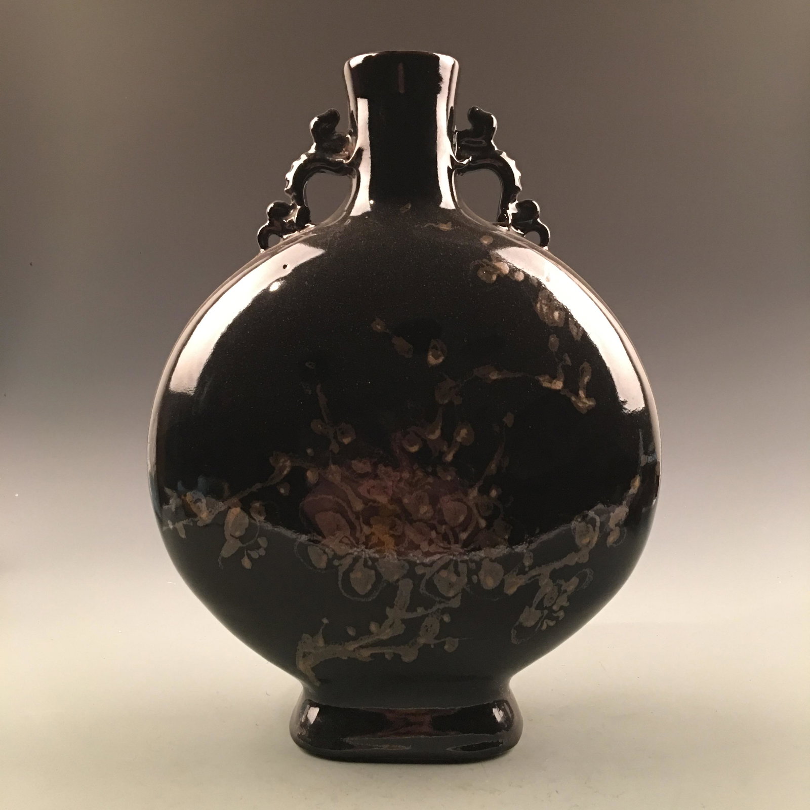 Chinese Black Moon Flask Vase: Chinese Black Moon Flask Vase 16'' H, 11'' W; 8.8 lb Shipping: We are able to pack and ship this item to an address in the United States for $40.00 via UPS Ground or USPS Priority Mail. Tracking infor