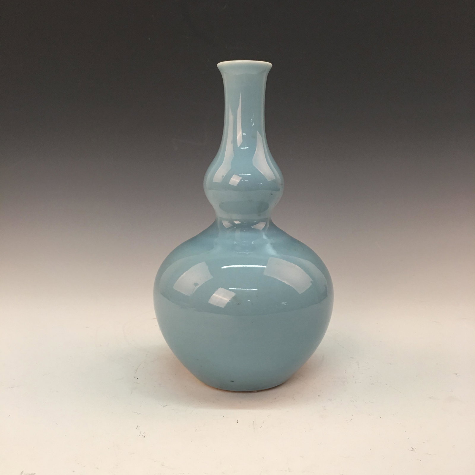 Chinese Azure Glazed Double Goured Vase,Qianlong Mark: Chinese Azure Glazed Double Goured Vase,Qianlong Mark 9-3/4'' H, 5'' W; 1.8 lb Shipping: We are able to pack and ship this item to an address in the United States for $35.00 via UPS Ground or USPS Pri
