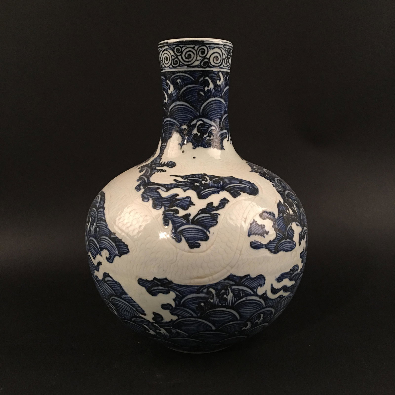 Chinese Blue-White 'Dragon' Globular Vase: Chinese Blue-White 'Dragon' Globular Vase 12'' H, 8-1/2'' W; 6 lb Shipping: We are able to pack and ship this item to an address in the United States for $50.00 via UPS Ground or USPS Priority Mail. T