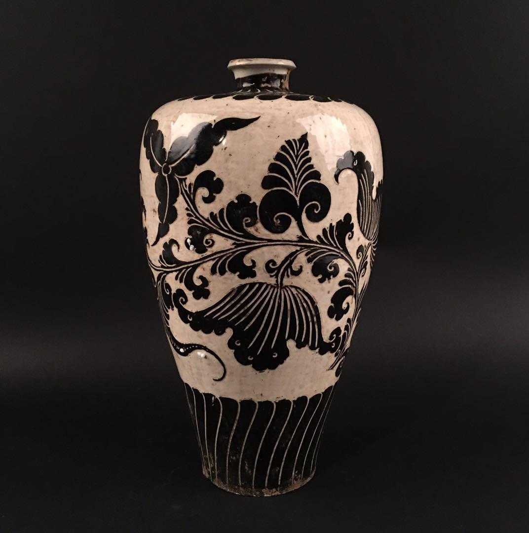 Chinese Cizhou Kiln 'Floral' Vase: Chinese Cizhou Kiln 'Floral' Vase 15'' H, 7'' W; 3053 g Shipping: We are able to pack and ship this item to an address in the United States for $40.00 via UPS Ground or USPS Priority Mail. Tracking in
