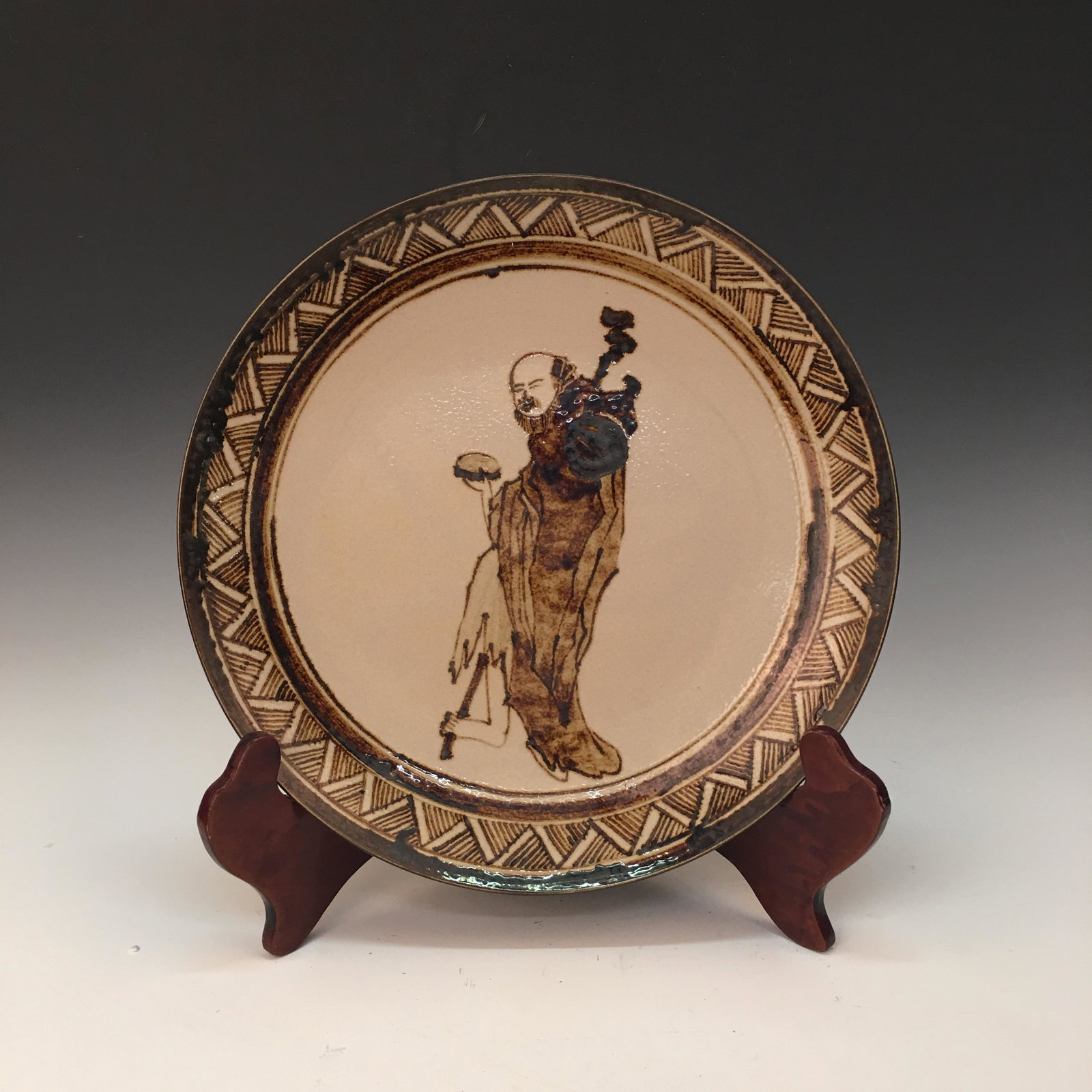 Chinese Cizhou Kiln Figure Plate: Chinese Cizhou Kiln Figure Plate 1-3/4'' H, 13-1/2'' W; 4 lb Shipping: We are able to pack and ship this item to an address in the United States for $50.00 via UPS Ground or USPS Priority Mail. Tracki
