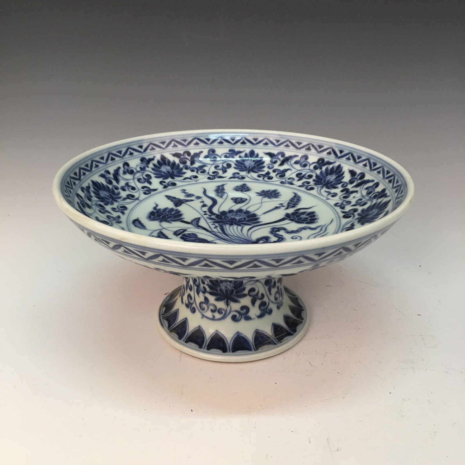 Chinese Blue-White 'Lotus' Standing Dish: Chinese Blue-White 'Lotus' Standing Dish 5'' H, 10'' W; 3.2 lb Shipping: We are able to pack and ship this item to an address in the United States for $40.00 via UPS Ground or USPS Priority Mail. Trac