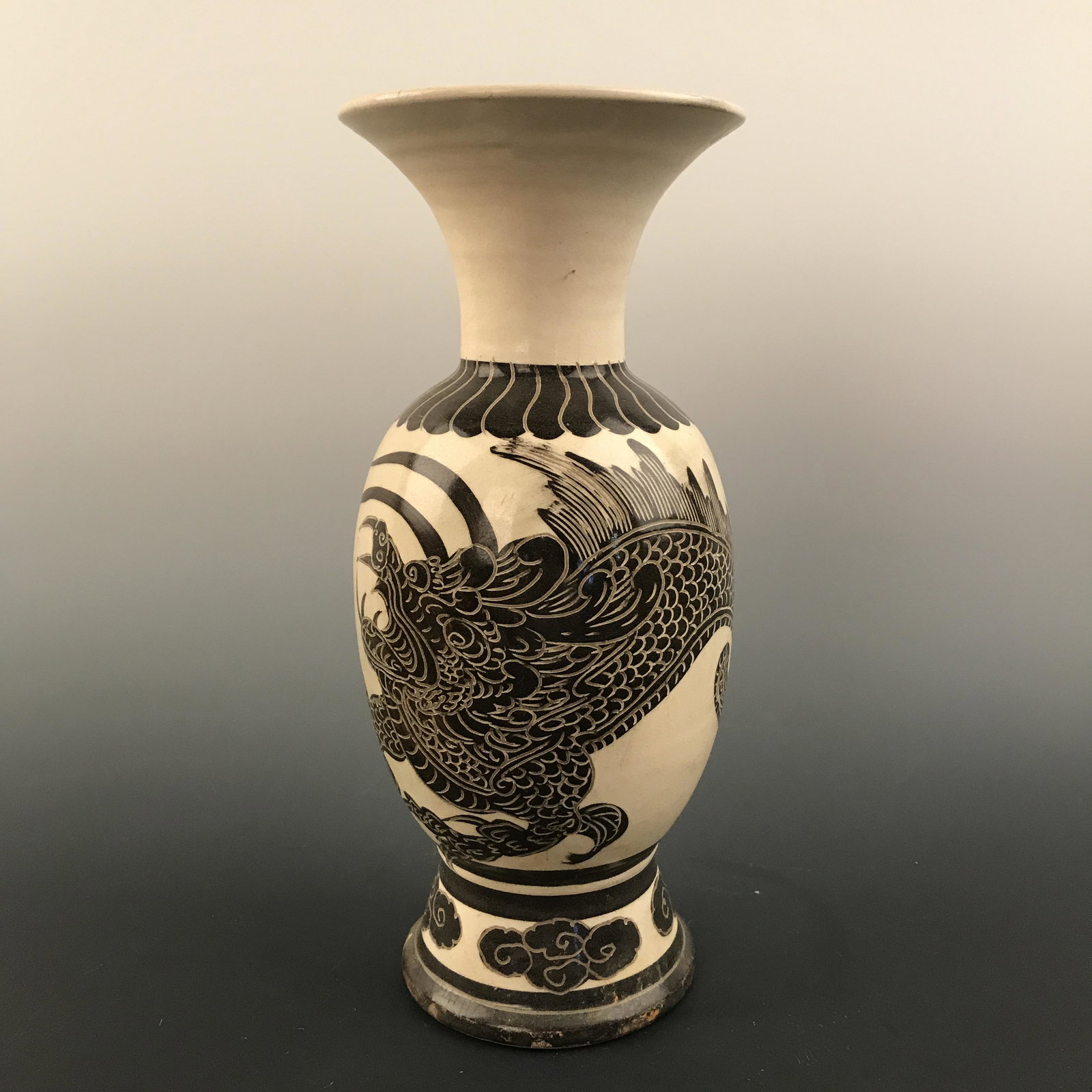 Chinese Jizhou Kiln 'Dragon' Vase: Chinese Jizhou Kiln 'Dragon' Vase 13'' H, 4-3/4'' W; 1725 g Shipping: We are able to pack and ship this item to an address in the United States for $40.00 via UPS Ground or USPS Priority Mail. Trackin