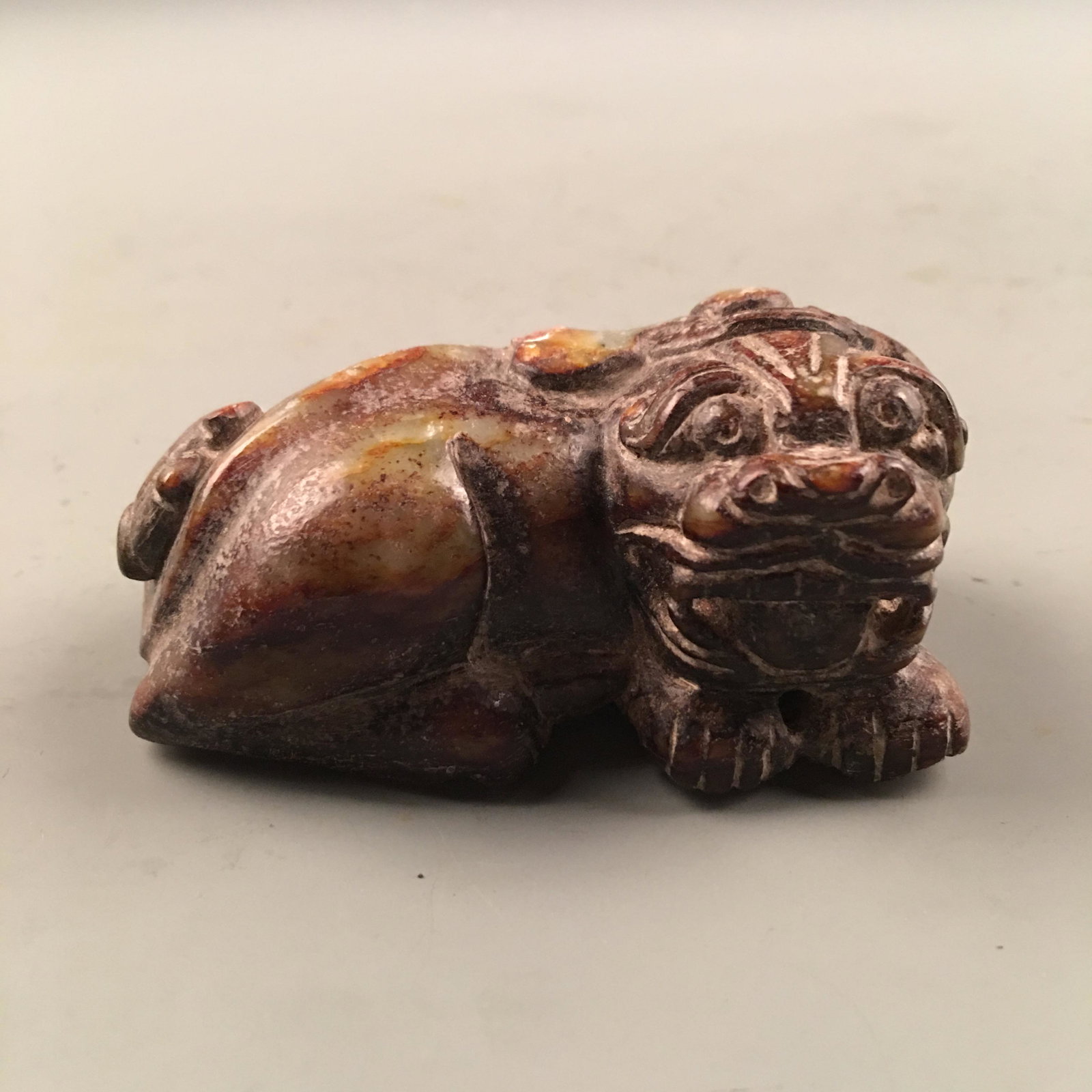 Chinese Archaic Jade 'Rui Shou': Chinese Archaic Jade 'Rui Shou' 1-3/8'' H, 2'' W, 3'' L; 246 g Shipping: We are able to pack and ship this item to an address in the United States for $25.00 via UPS Ground or USPS Priority Mail. Trac