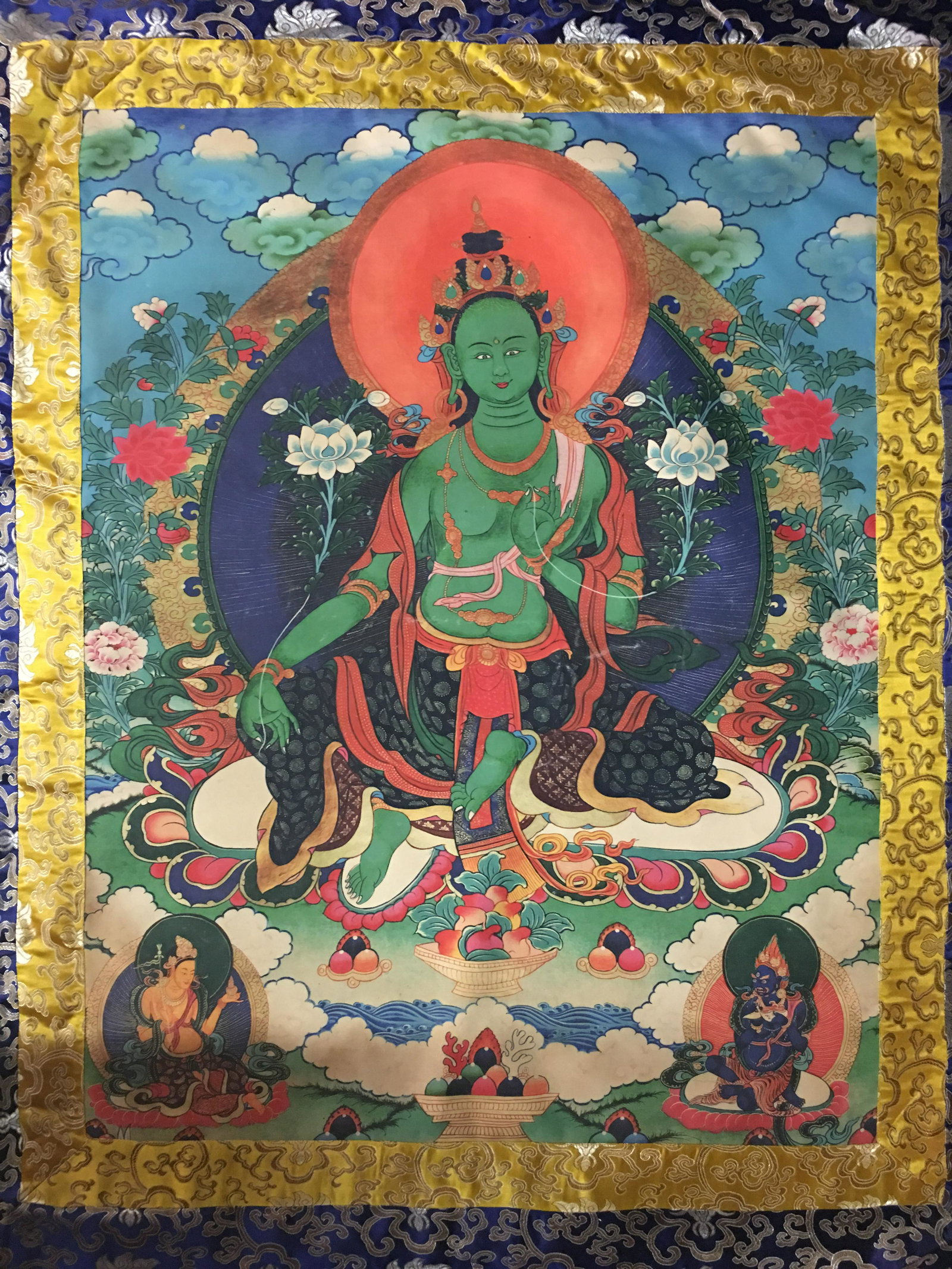 Chinese Thangka of Bodhisattva Green Tara on Silk: Chinese Thangka of Bodhisattva Green Tara on Silk 44''H, 37''W; 227 g Shipping: We are able to pack and ship this item to an address in the United States for $30.00 via UPS Ground or USPS Priority Mai