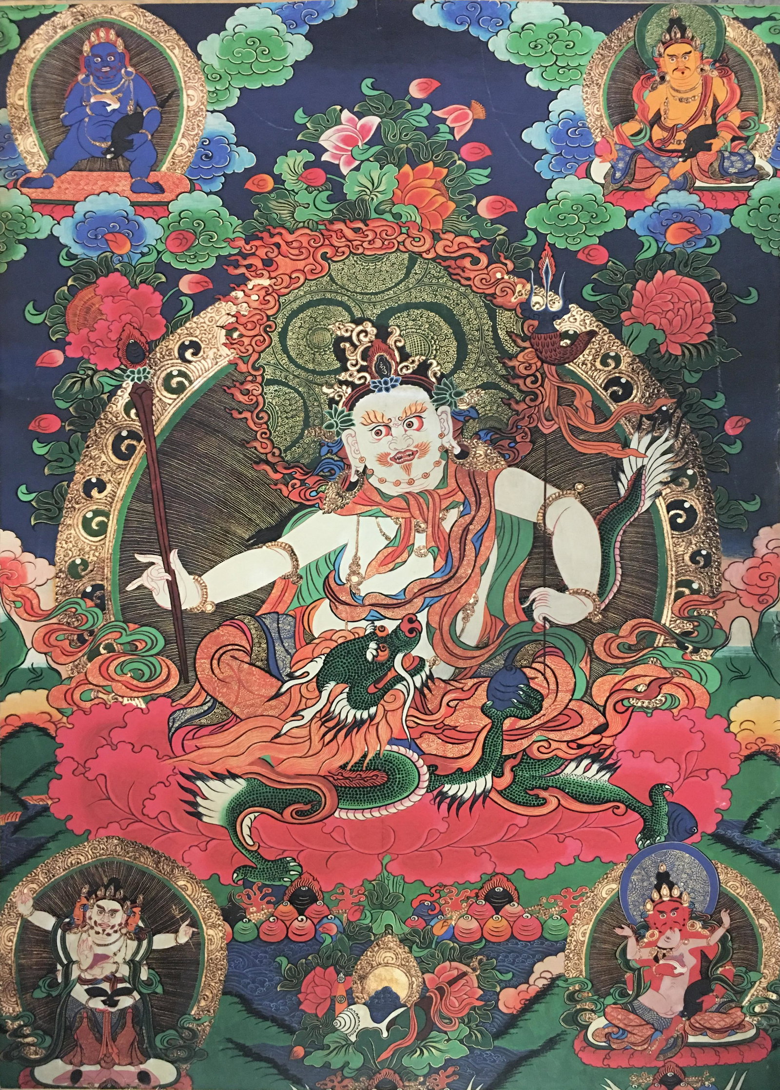 Thangka Painting of White Jambhala: Thangka Painting of White Jambhala 35-1/4'' H, 25-1/2'' W; 0.2 lb Shipping: We are able to pack and ship this item to an address in the United States for $25.00 via UPS Ground or USPS Priority Mail. T