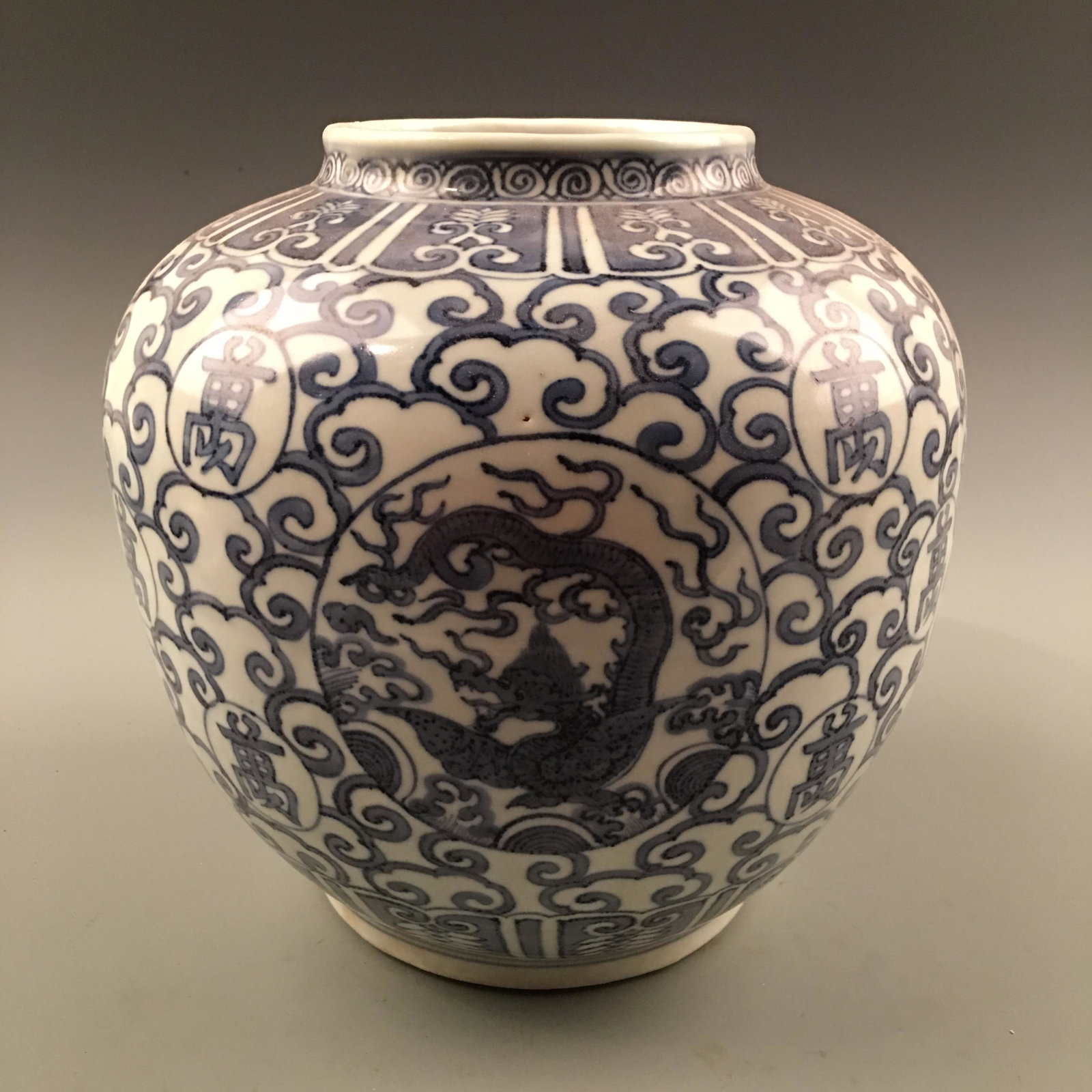 White-Blue Dragon Jar with Wanli Mark: White-Blue Dragon Jar with Wanli Mark 9-1/4'' H, 8-3/4'' W; 5.8 lb Shipping: We are able to pack and ship this item to an address in the United States for $35.00 via UPS Ground or USPS Priority Mail. 