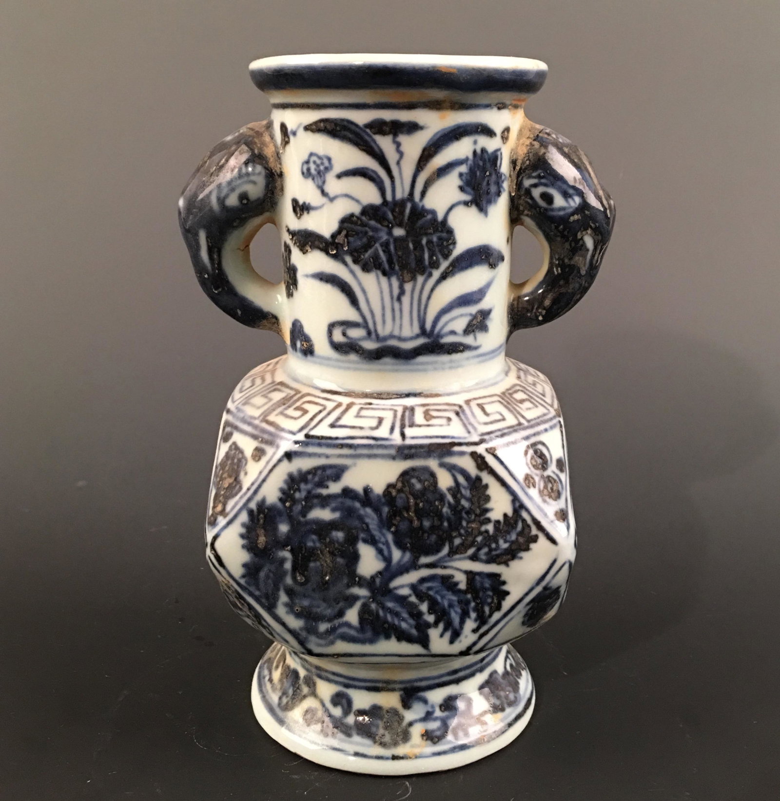 Chinese Blue-White 'Lotus' Jar and Elephant Head: Chinese Blue-White 'Lotus' Jar and Elephant Head Handles Vase 7'' H, 4'' W; 1.8 lb Shipping: We are able to pack and ship this item to an address in the United States for $30.00 via UPS Ground or USPS