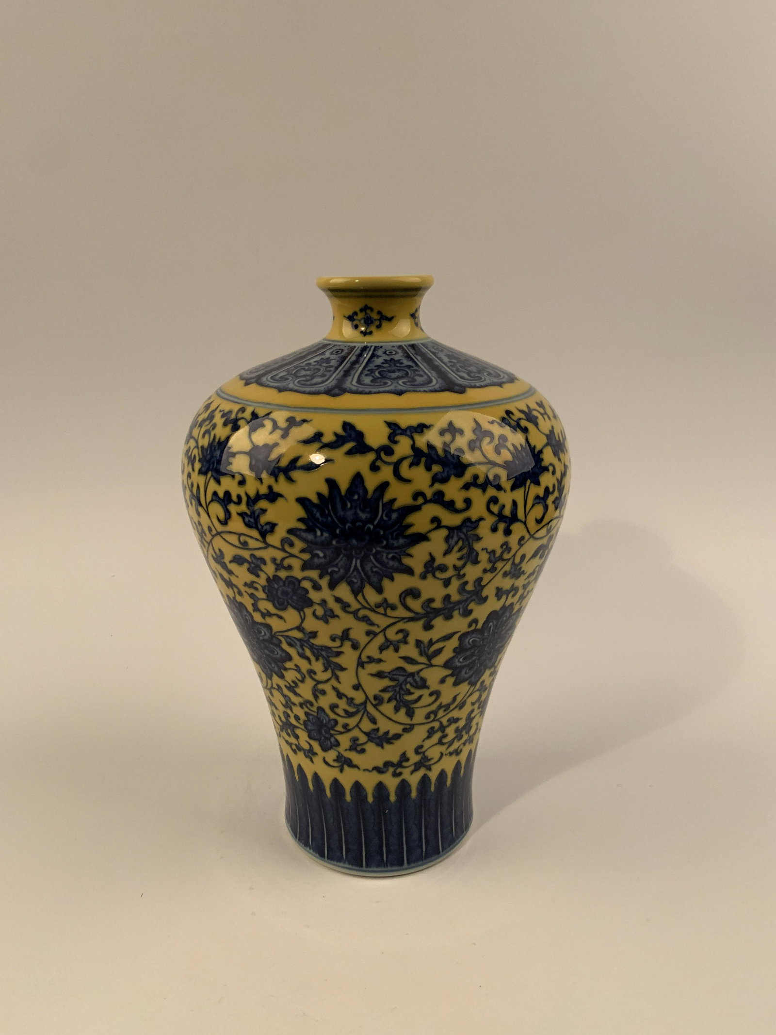 Chinese Qing Yellow and Blue Glazed Meiping: Chinese Qing Yellow and Blue Glazed Meiping 13'' H, 8-1/2'' W; 7.2 lb Shipping: We are able to pack and ship this item to an address in the United States for $40 via UPS Ground or USPS Priority Mail. 