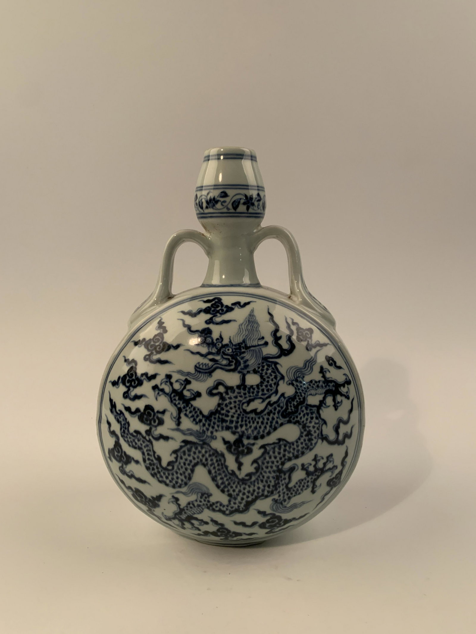 Chinese Blue and White Dragon Vase: Chinese Blue and White Dragon Vase 13'' H,9'' W; 7.2 lb Shipping: We are able to pack and ship this item to an address in the United States for $40 via UPS Ground or USPS Priority Mail. Tracking infor