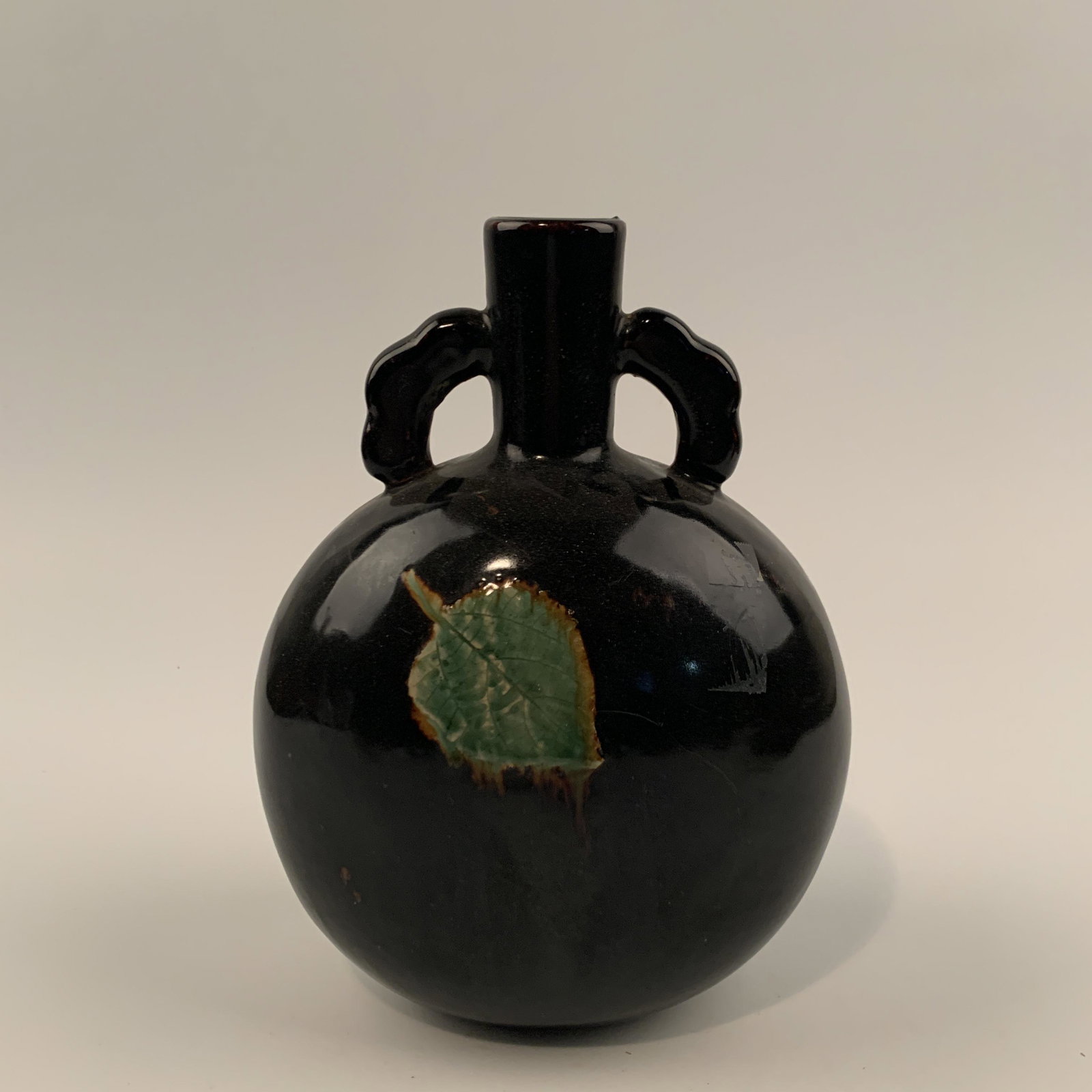 Chinese Jizhou Yao Leaves Vase: Chinese Jizhou Yao Leaves Vase 10'' H, 7-1/2'' W; 3 lb Shipping: We are able to pack and ship this item to an address in the United States for $40 via UPS Ground or USPS Priority Mail. Tracking inform