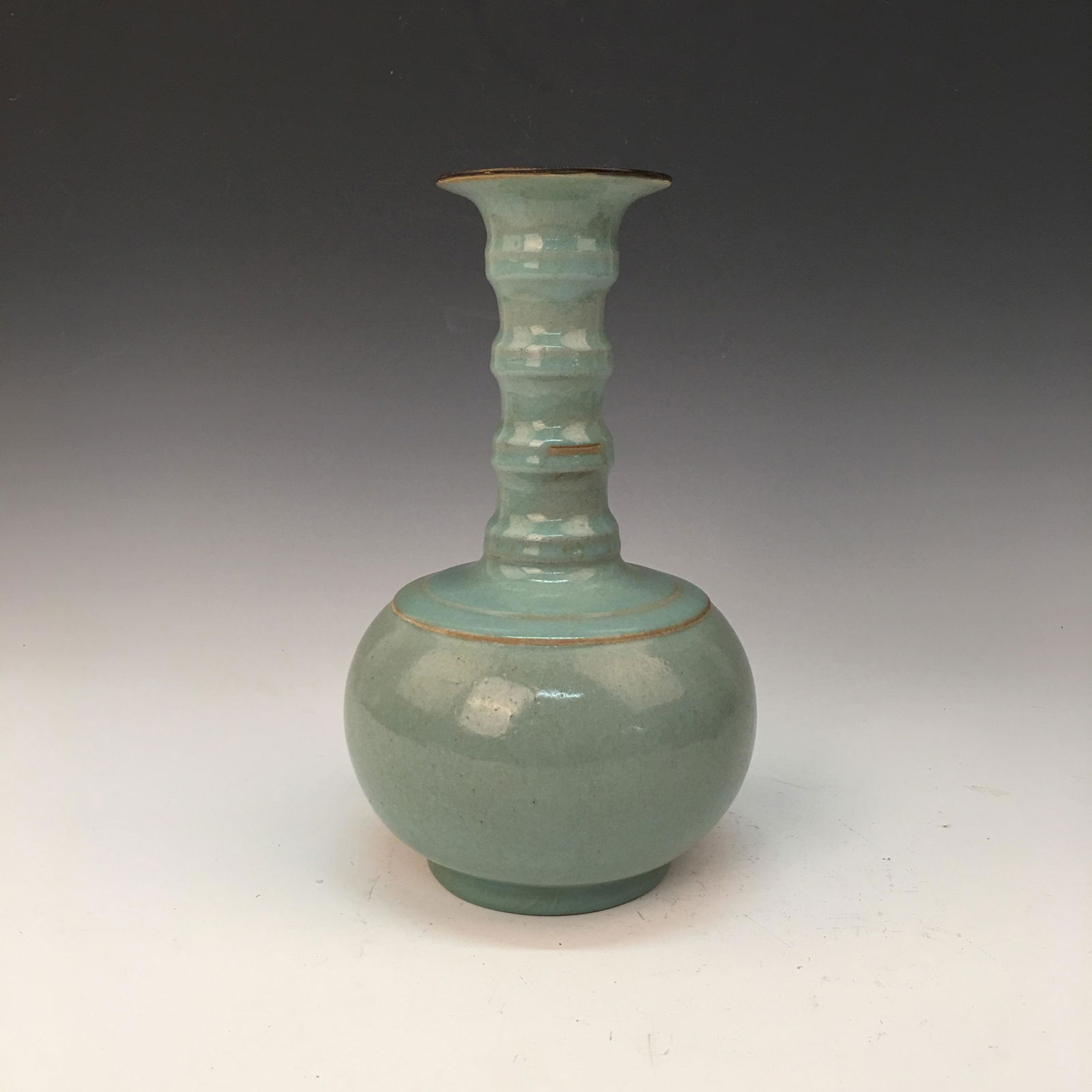 Chinese Longqun Kiln Bottle Vase: Chinese Longqun Kiln Bottle Vase 9-1/2'' H, 5-1/2'' W; 2.2 lb Shipping: We are able to pack and ship this item to an address in the United States for $35.00 via UPS Ground or USPS Priority Mail. Track