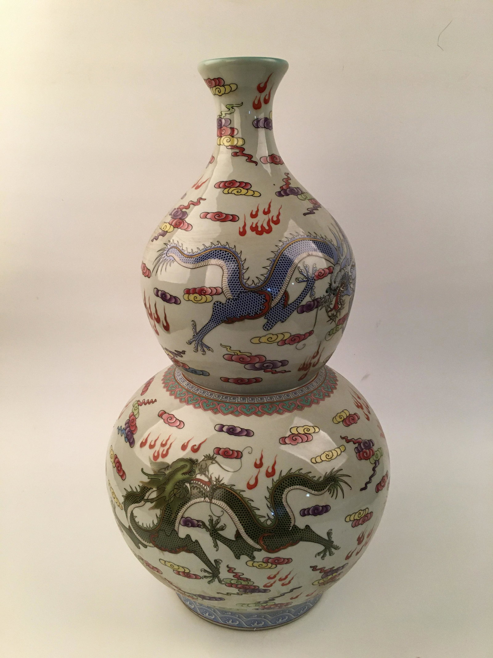 Chinese Famille Rose Dragon Vase: Chinese Famille Rose Dragon Vase 25'' H, 13'' W; 20.8 lb Shipping: We are able to pack and ship this item to an address in the United States for $50 via UPS Ground or USPS Priority Mail. Tracking info