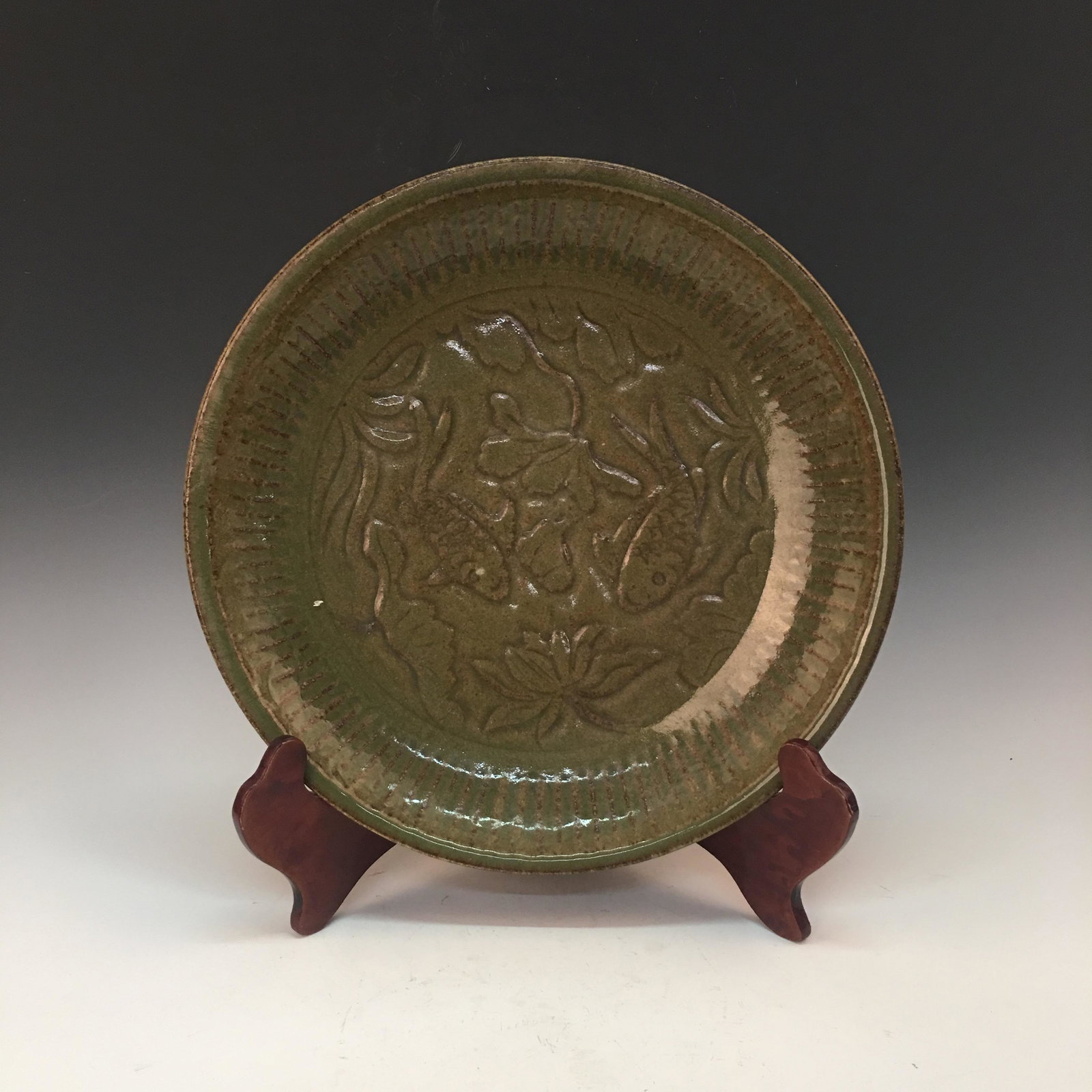 Chinese Longquan Kiln Plate: Chinese Longquan Kiln Plate 2-1/2'' H, 15'' W; 6.2 lb Shipping: We are able to pack and ship this item to an address in the United States for $55.00 via UPS Ground or USPS Priority Mail. Tracking info