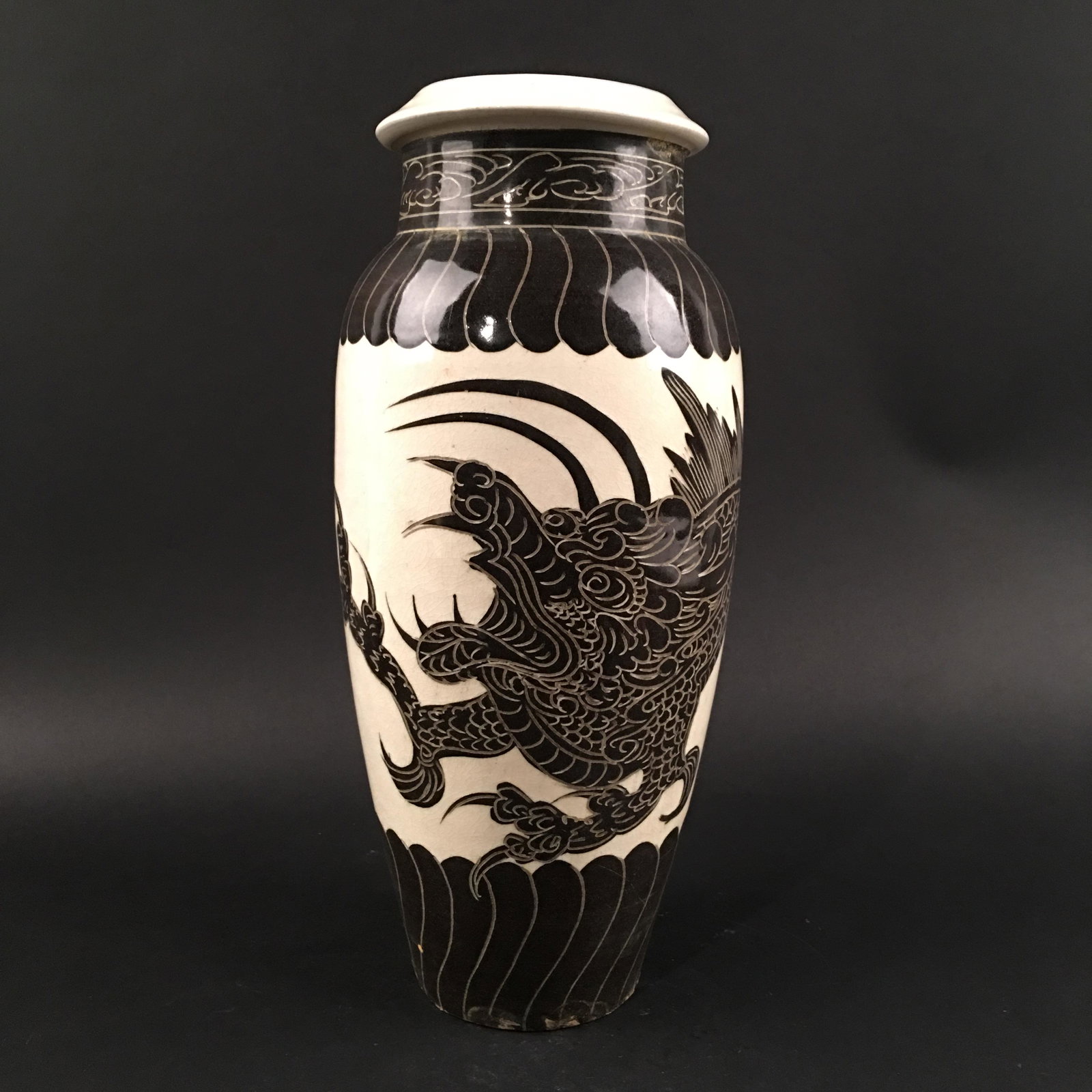 Chinese Cizhou Kiln 'Dragon' Vase: Chinese Cizhou Kiln 'Dragon' Vase 13'' H, 5'' W; 3.2 lb Shipping: We are able to pack and ship this item to an address in the United States for $35.00 via UPS Ground or USPS Priority Mail. Tracking in