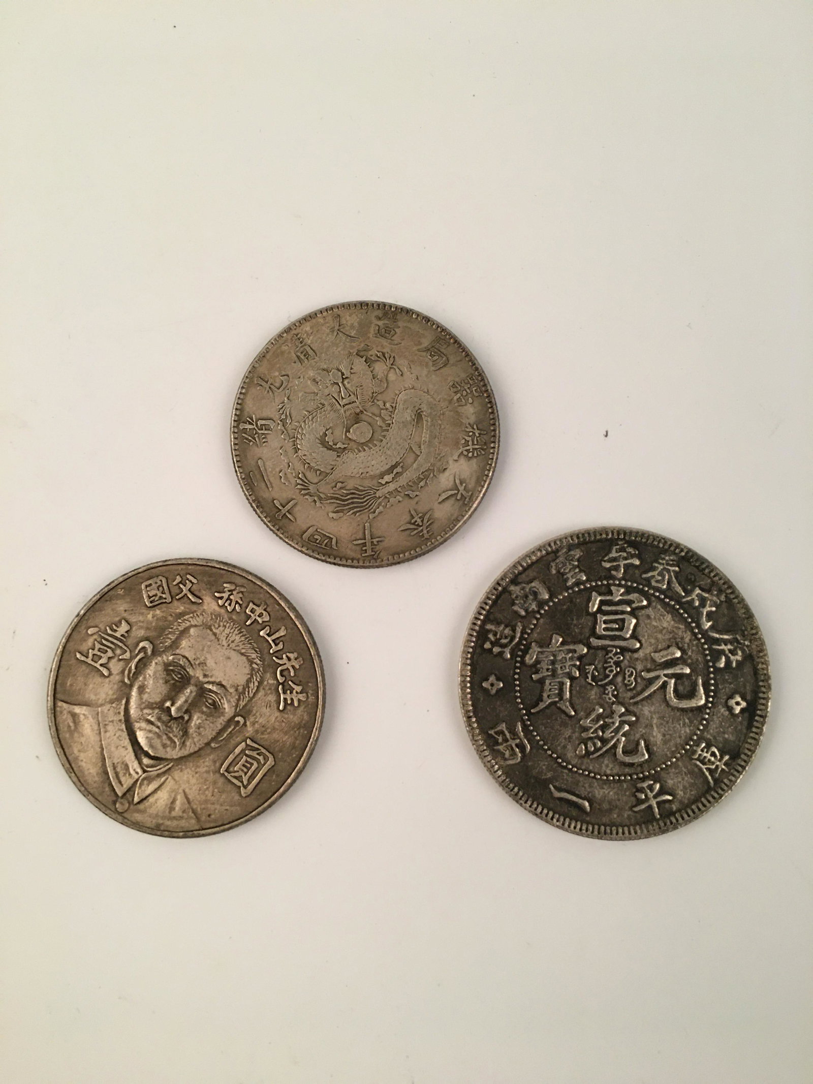 Chinese Silver Coin 3 Pieces: Chinese Silver Coin 3 Pieces 83 g Shipping: We are able to pack and ship this item to an address in the United States for $25 via UPS Ground or USPS Priority Mail. Tracking information will be sent to