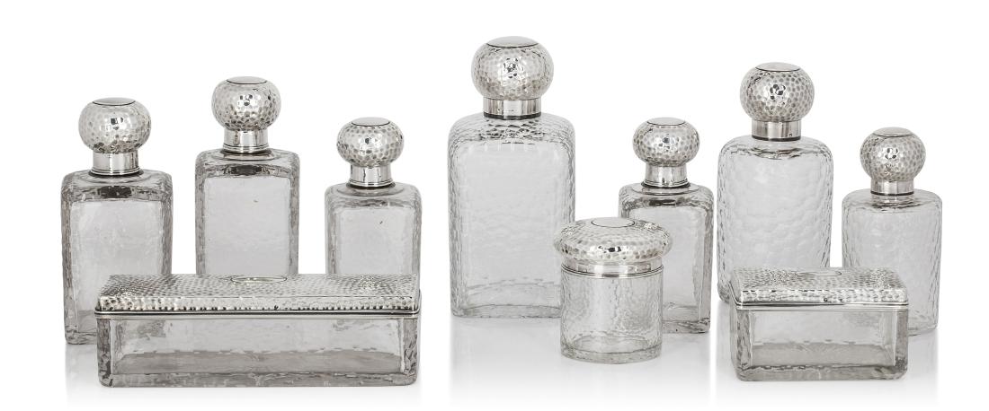An assembled French martelé silver and glass ten piece (1 of 2)