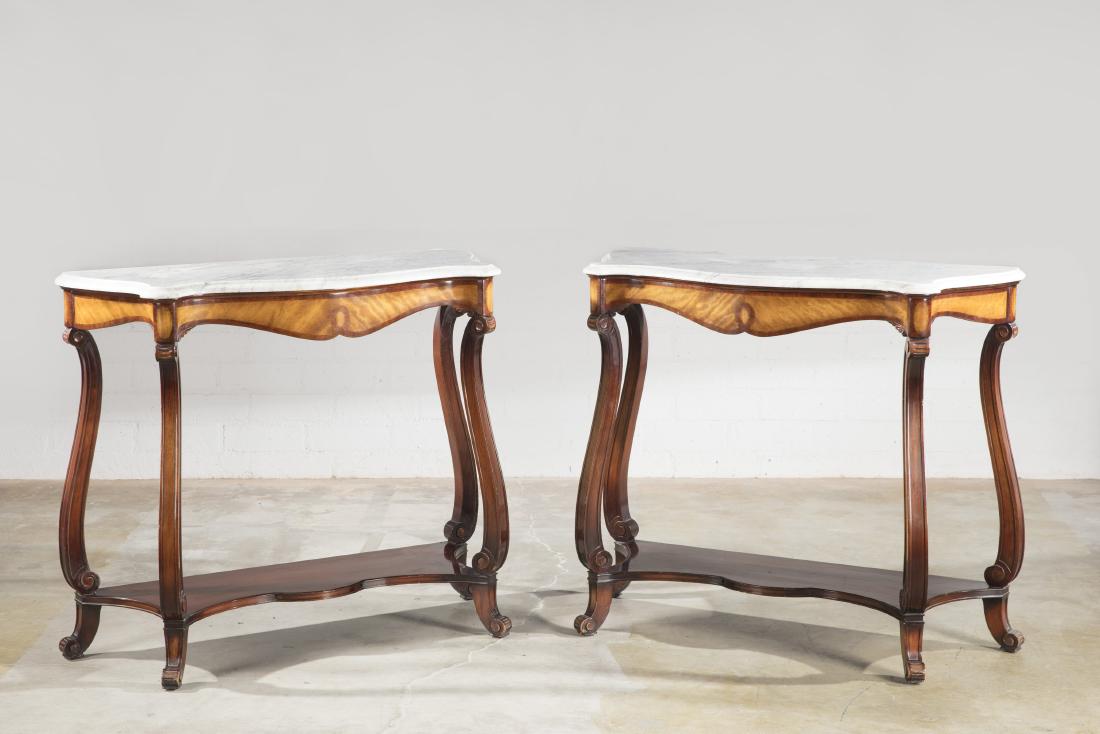 A pair of mahogany console tables modern: A pair of mahogany console tables modern height 35 3/4in; width 42 1/2in (108cm); depth 17 1/2in (44.5cm)