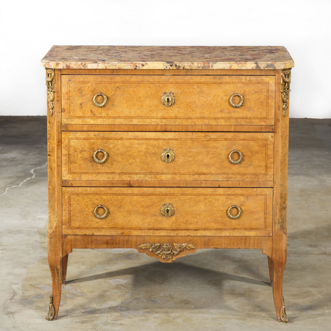 A Louis XV/XVI transitional style amboyna chest (1 of 3)