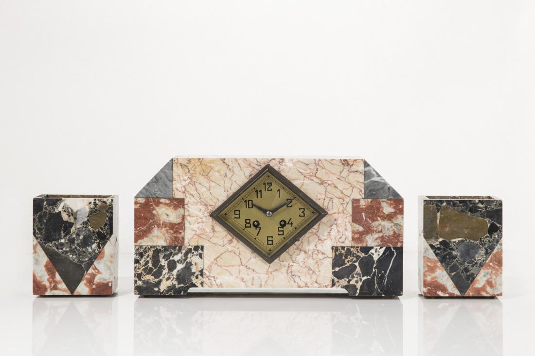 An Art Deco specimen marble clock garniture (1 of 3)