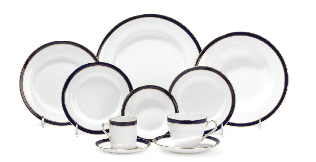 A Spode bone china part dinner service: A Spode bone china part dinner service second half 20th century Green factory mark and red painted pattern Y7332; comprising eight 10 1/2in dinner plates; eight 8in salad plates; eight 9in soup bowls;