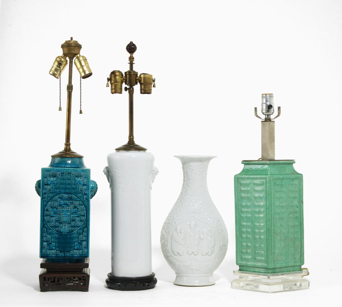 Four Chinese porcelain vases: A group of four Chinese porcelain vases 20th century Three mounted as lamps, one drilled but unmounted. the unmounted vase height 14in (35.5cm); width 7 1/2in (19cm)