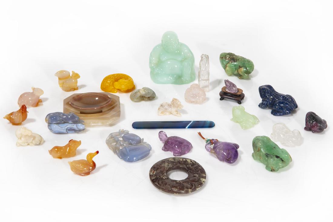 Twenty seven hardstone and lapidary carvings: An assembled group of twenty seven Asian and Continental hardstone and lapidary carvings 20th century Comprising mainly quartz, amethyst, chalcedony, fluorite, calcite and agate minerals formed as fig