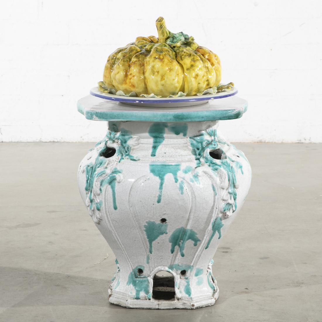 A Continental earthenware stove & Italian tureen: A Continental glazed earthenware stove Together with an Italian gourd form tureen and stand. (2) the stove height 17 1.4in (44cm); width 14 1/2in (37cm); depth 14 3/4in (37.5cm)