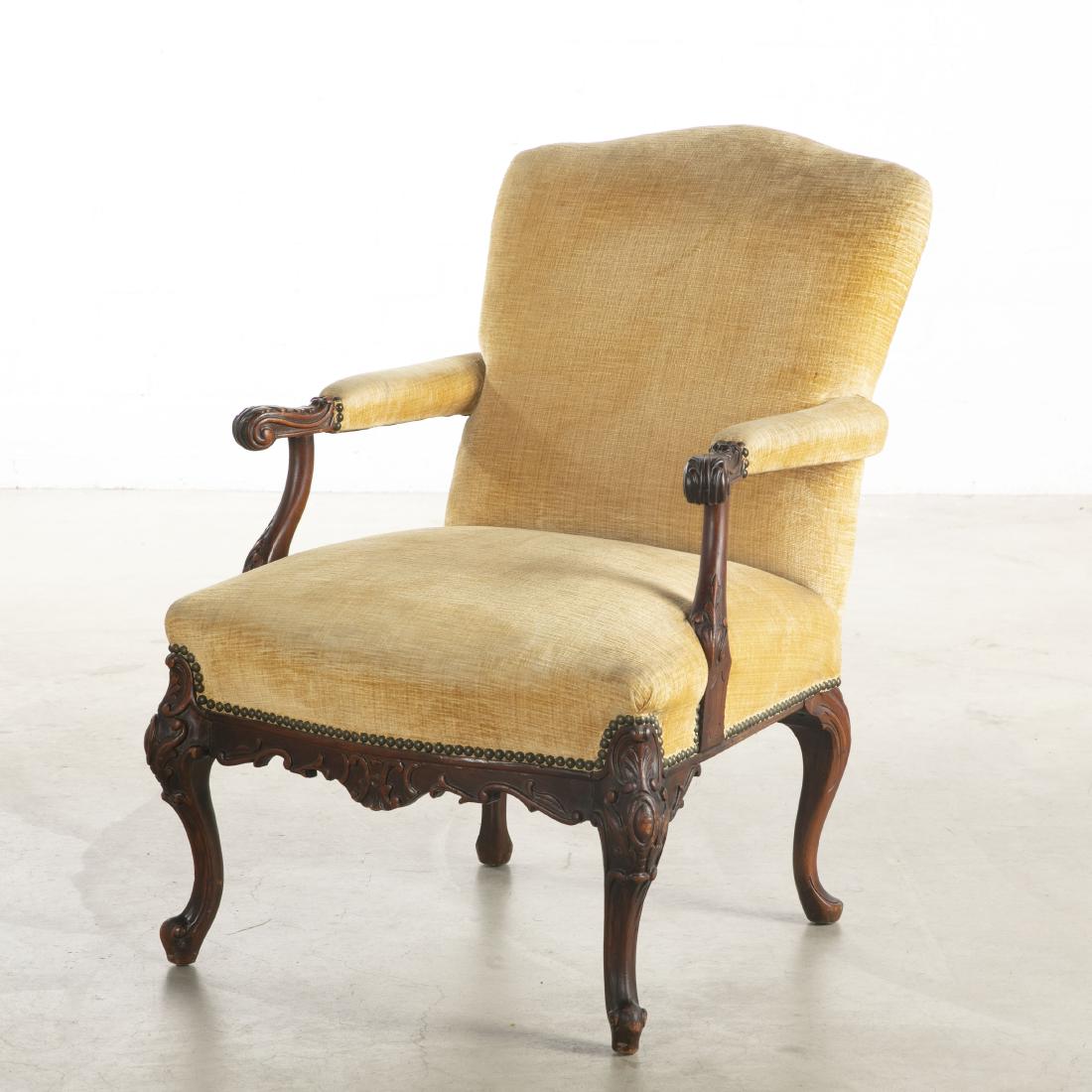 A George II style carved mahogany armchair: A George II style carved mahogany armchair late 19th/early 20th century height 35 3/4in (91cm); width 26in (66cm); depth of seat 20 1/2in (52cm)