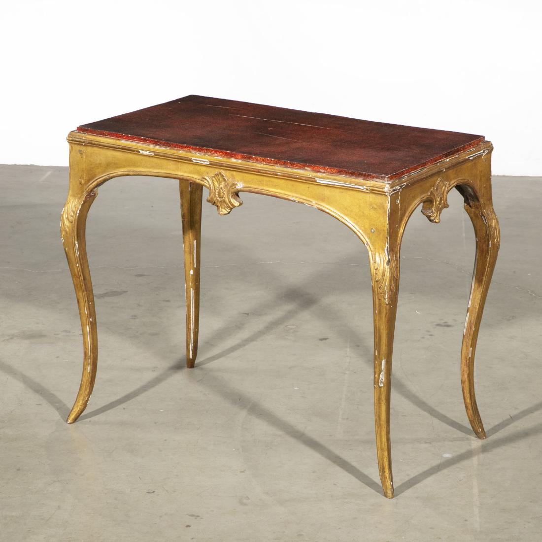 A Louis XV giltwood & faux porphyry center table: A Louis XV carved giltwood and faux porphyry inset center table 18th century and later height 29in (73.5cm); width 35 3/4in (91cm); depth 20 1/4in (51cm)
