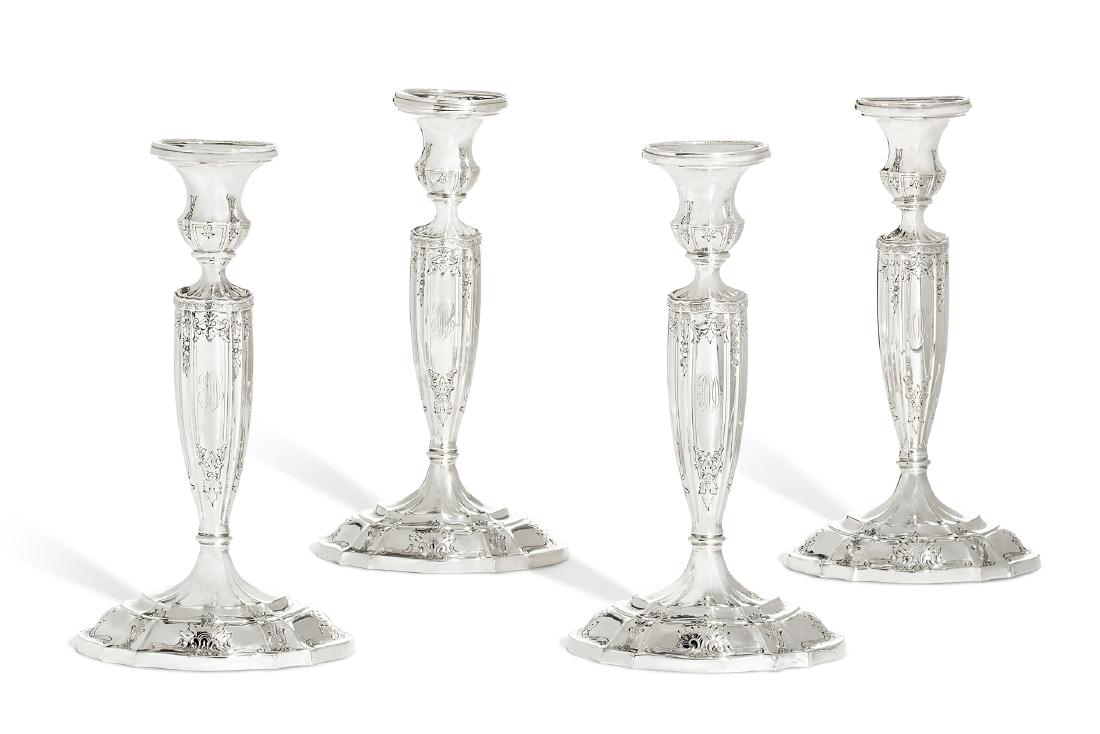 Four Gorham weighted sterling candlesticks (1 of 2)
