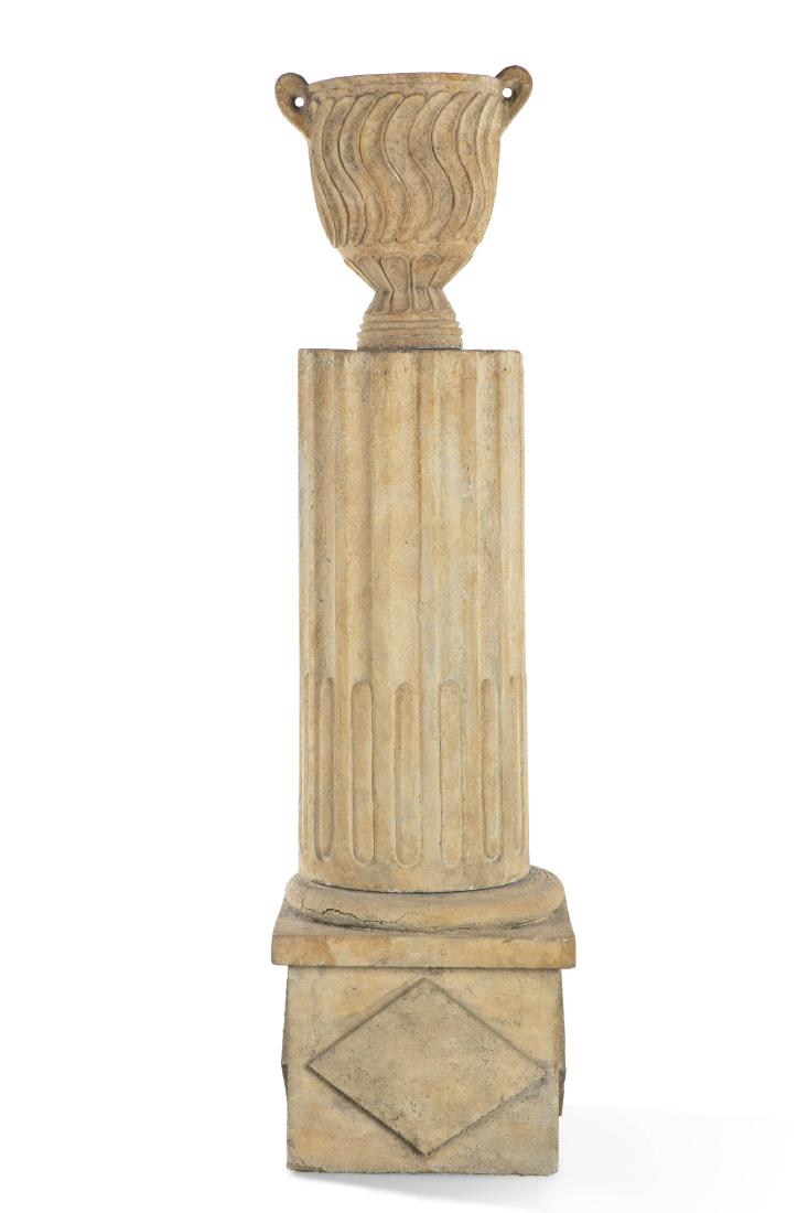 A Louis XVI style cast stone urn on fluted column (1 of 3)