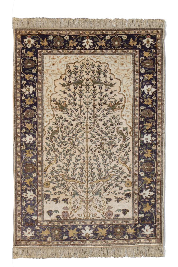 An Afghan tree of life rug: An Afghan tree of life rug dimensions approximately 6ft 1in x 4ft 2in (185.5 x 127cm)Provenance: Property of Stuart Myers, Brentwood, California.