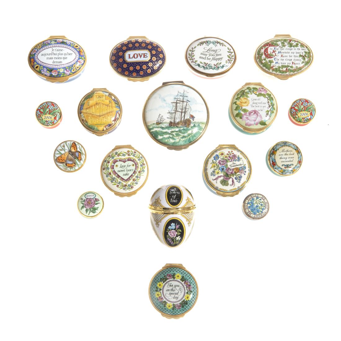 Collection of seventeen English enamel pill boxes: A collection of seventeen English enamel pill boxes 20th century Comprising eleven boxes by Halcyon Days, three boxes by Bilston and Battersea, three boxes by Staffordshire Enamels, all with printed f