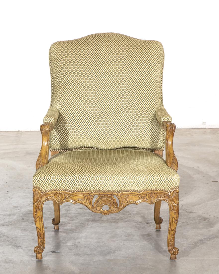 A Michael Taylor Regence style carved fautueil: A Michael Taylor Designs Regence style carved fauteuil modern With applied brass plaque and fabric label to the underside both inscribed MICHAEL TAYLOR DESIGNS INCORPORATED SAN FRANCISCO. height 41in