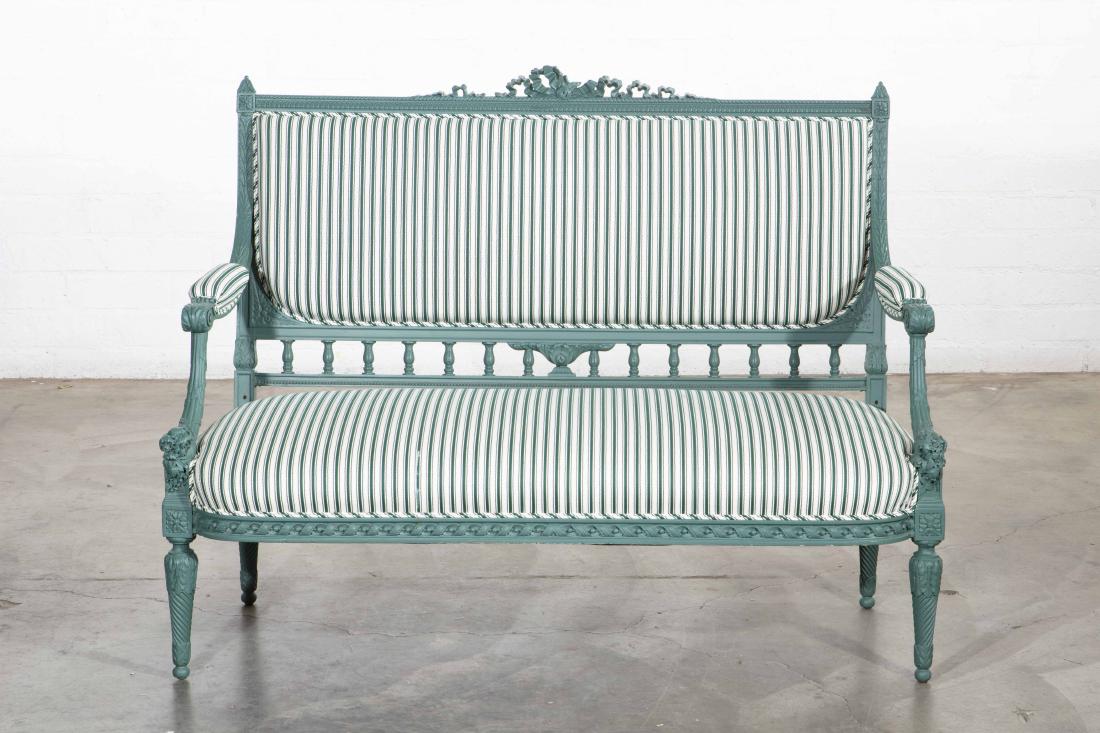 A Louis XVI style teal painted canape: A Louis XVI style teal painted canape early 20th century height 39in (99cm); width 49 1/2in (126cm); depth of seat 22 1/2in (57cm) Provenance: Propertyof Stuart Myers, Brentwood, California.