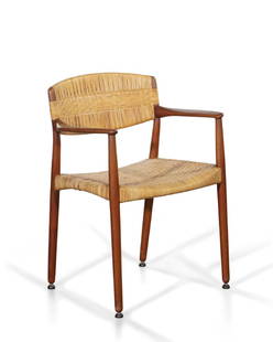 An Madsen and Larsen teak armchair by Willy Beck: An Aksel Bender Madsen and Ejner Larsen teak and caned armchair by Willy Beck, Denmark circa 1958 height 32 1/2in (82.5cm); width 24 3/4in (63cm); depth of seat 19in (48cm)Footnote: Ejner Larsen (Dani