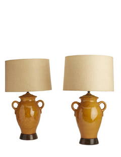 A pair of Billy Haines ceramic jug lamps: A pair of William (Billy) Haines glazed ceramic jugs now as lamps designed 1950 height 27 1/2in (70cm)Provenance: Property from the Collection of Frances and Sidney Brody.