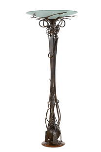 An Albert Paley forged steel Sphere floor lamp: An Albert Paley patinated forged steel and frosted glass Sphere floor lamp 1994 cast signature and date to base height 73 1/2in (186.75cm); diameter 29in (73.5cm)Provenance: Property from a Private Co