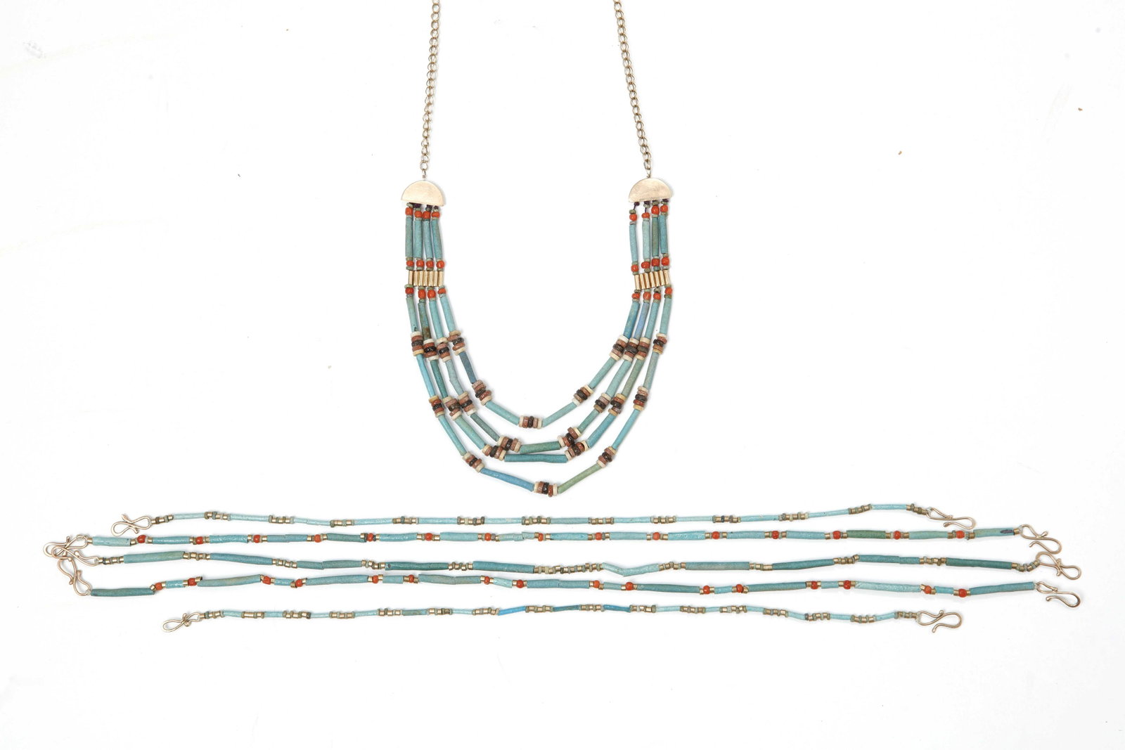 A group of six turquoise beaded necklaces: A group of six turquoise, carnelian and stone beaded necklaces one with marked 14K gold clasp Multi-strand necklace with clasp marked for JH, 585, London, 1984. length of multistrand necklace 23 1/2in