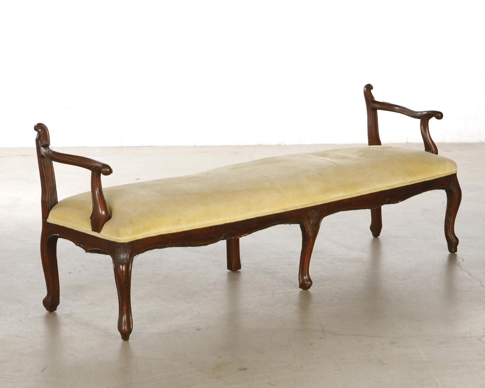 A large Italian Rococo stained walnut bench: A large Italian Rococo stained walnut bench second half 18th century height 30in (76cm); width 78in (198cm); depth of seat 20in (51cm)