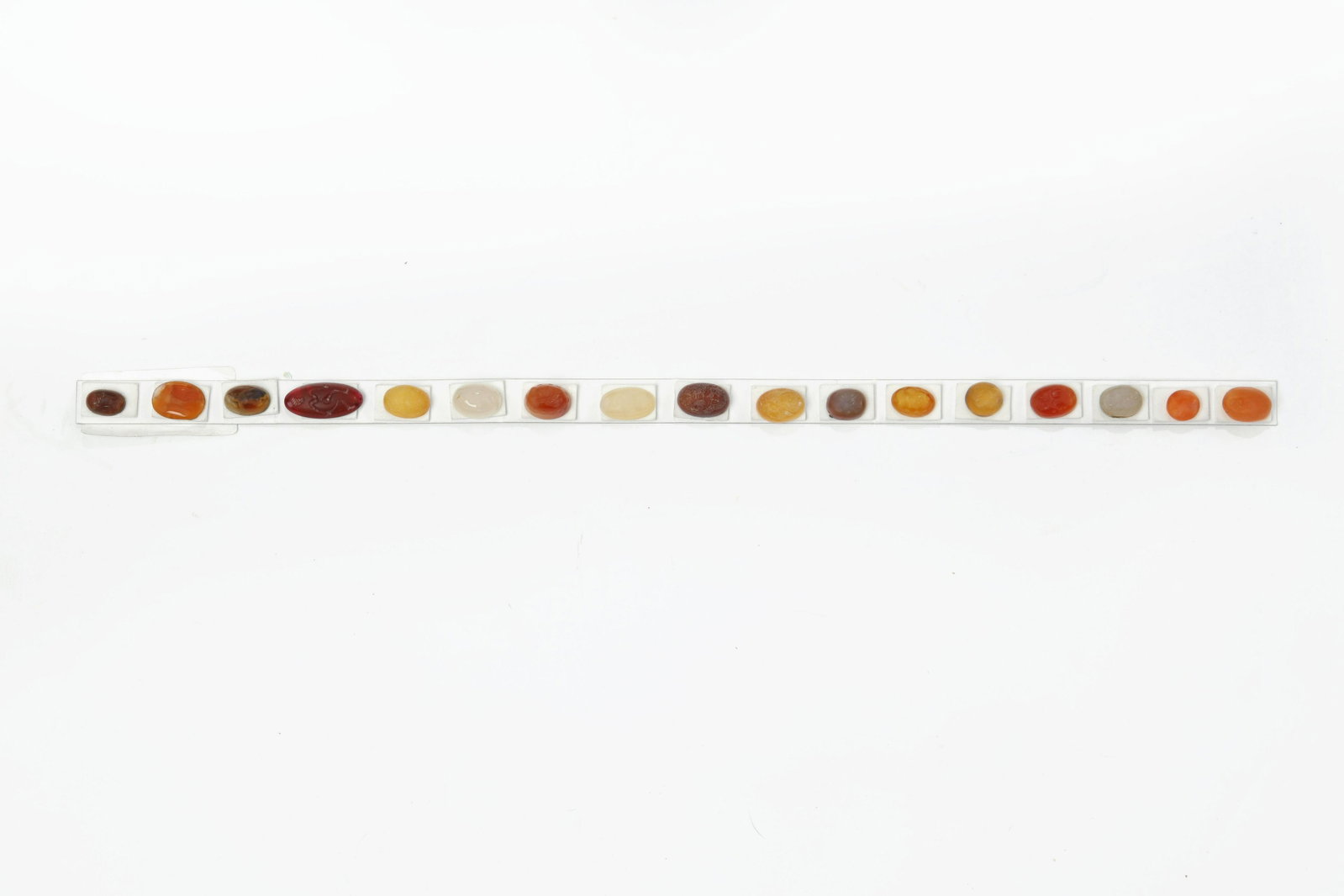 Seventeen carnelian & hardstone intaglios: A collection of seventeen carnelian and hardstone intaglios the longest 1 1/8in (3cm)