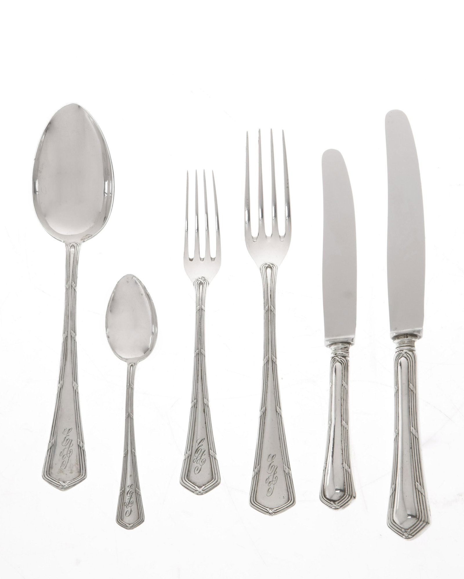 German 800 silver part flatware set for twelve, 61pcs: A German 800 standard silver part flatware service for twelve maker s mark rubbed early 20th century Comprising 12 table forks, 12 table knives, 12 table spoons, 12 luncheon forks, 11 luncheon knives 