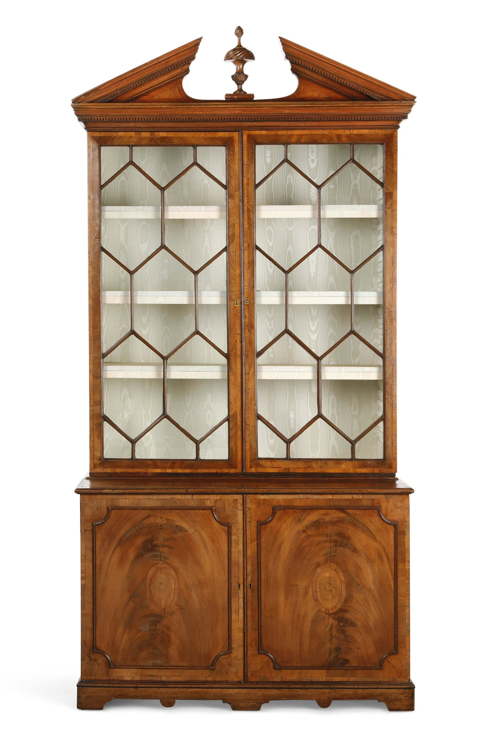 A George III yewwood inlaid mahogany bookcase: A George III yewwood inlaid mahogany bookcase probably Irish late 18th century reduced in height height 100 1/2in (255.5cm); width 52in (132cm); depth 24 1/4in (61.5cm) Provenance: Property from the e