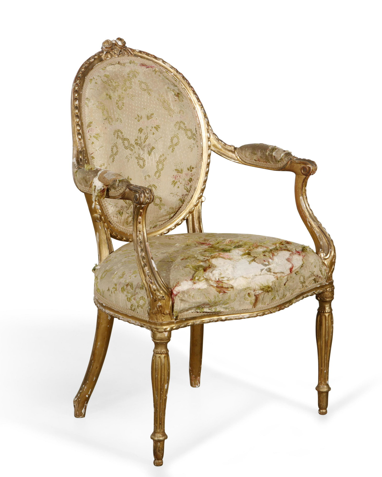 A George III carved giltwood armchair: A George III carved giltwood armchair in the manner of John Linnell late 18th century height 28 1/2in (72.5cm); width 24 1/2in (62cm); depth of seat 18in (45.5cm) Provenance: Property from a Private C